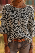 Oversized leopard print knit sweater in black and white - front view